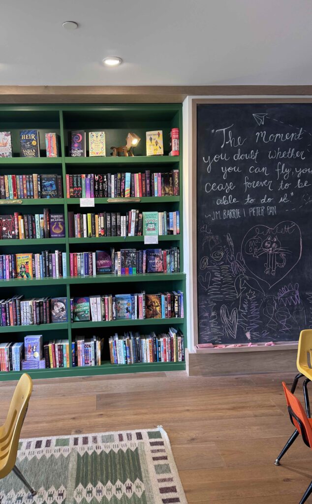 Godmothers children's section with quote